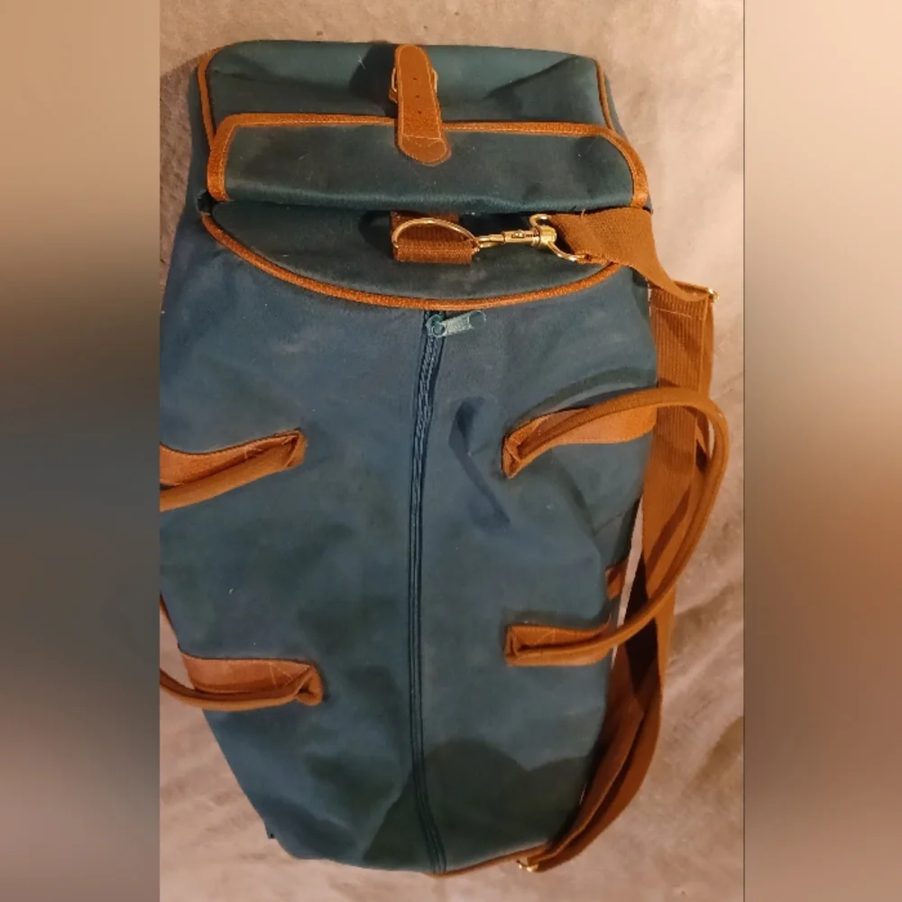 Duffle bag fancy straps are nice accents to this bag